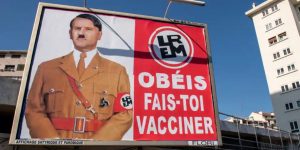 Macron’un Hitler’e Benzetildiği Afişi Asana 10 Bin Avro Ceza
